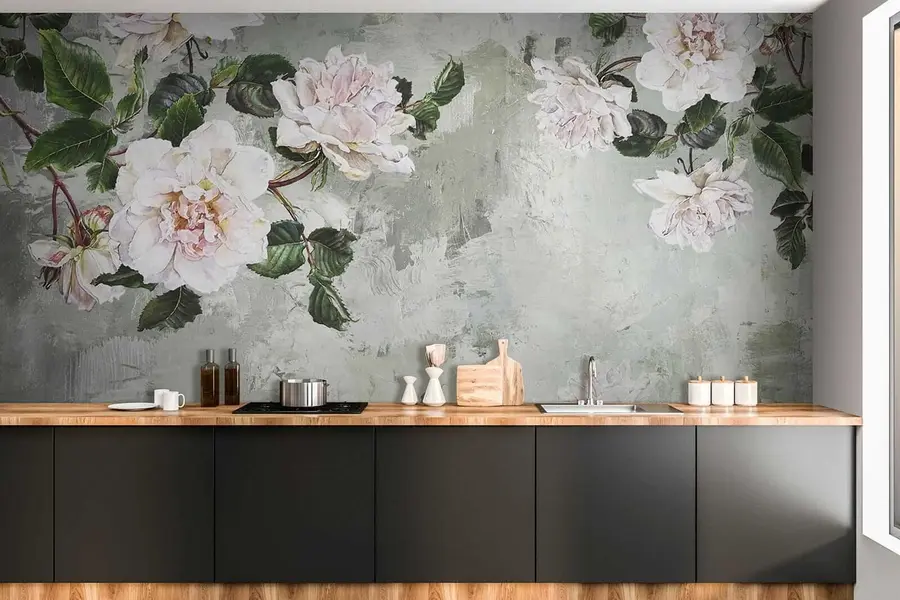 wall murals Blooming branches on the background of a shabby wall u37301