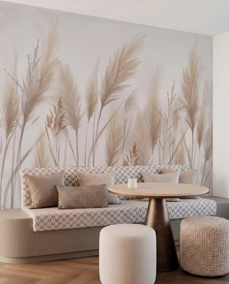 wall murals Tall beige grass blades spikelets swaying in the wind against a soft, light background w08268