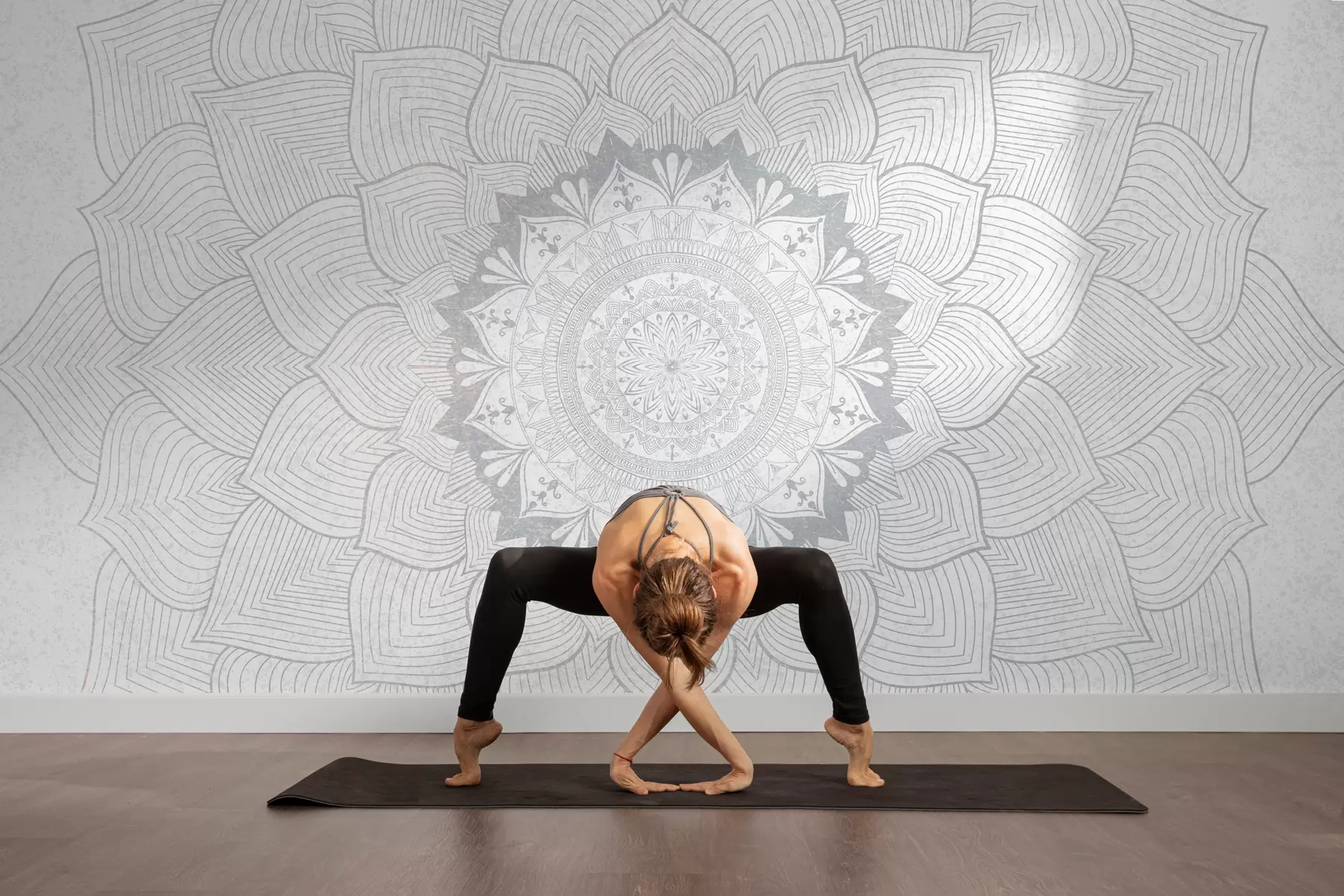 wall murals Round mandala, wallpaper for yoga space or to harmonize personal space. Wall mandala in gray shades on a textured heterogeneous background w01088v2