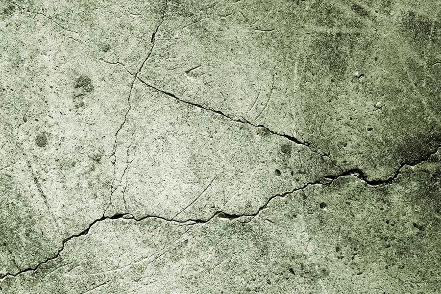 wall murals Weathered concrete with a fractured surface u75783v1