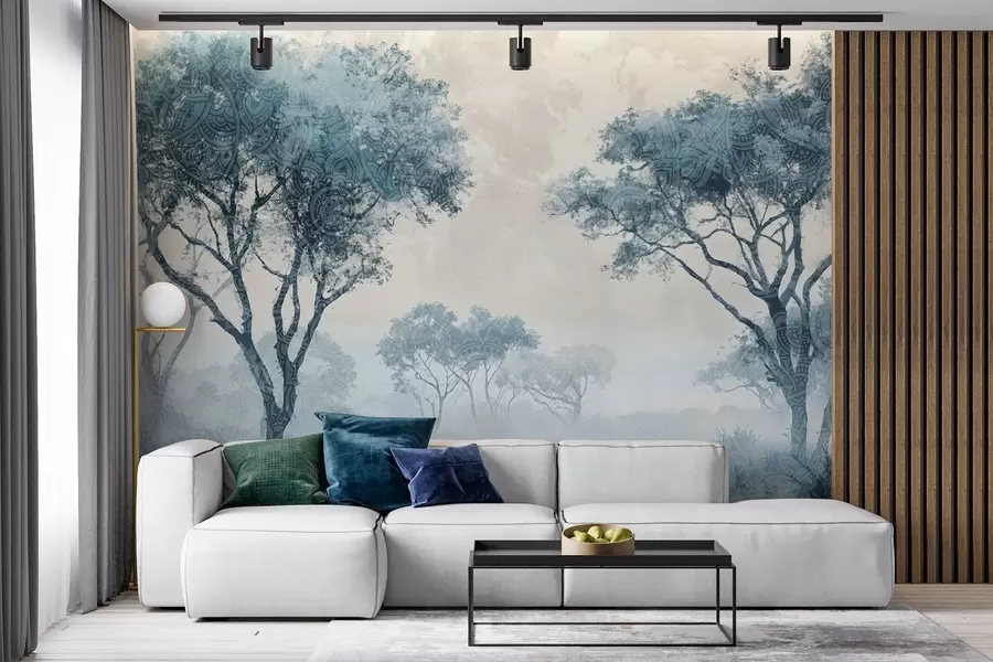 wall murals A misty, serene landscape with silhouetted trees in the foreground with soft fog in shades of blue and beige w08442