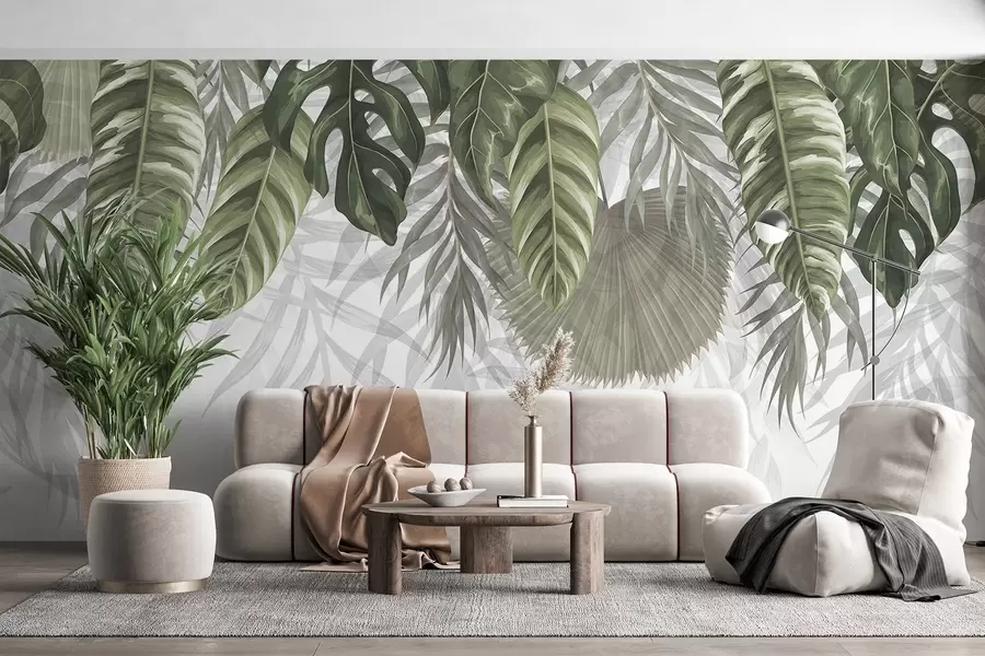 wall murals Tropical leaves in shades of green including large monstera leaves and palm fronds on white background w08443