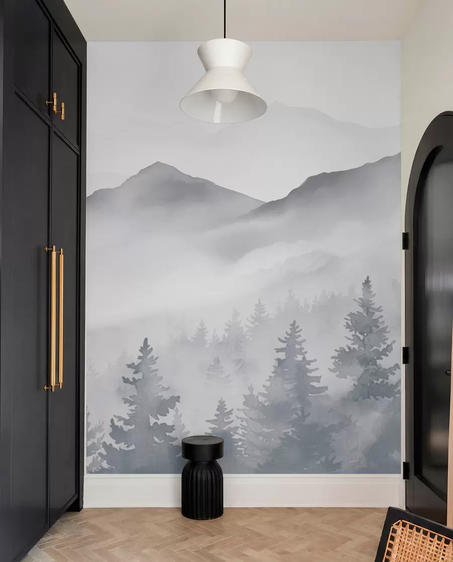 wall murals Serene mountain landscape with misty forests in soft gray and blue tones w08680