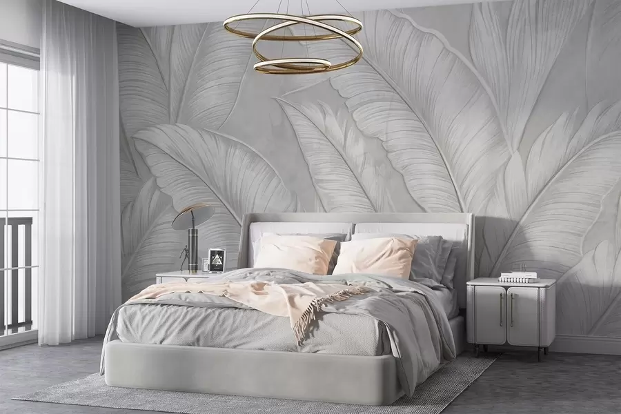 wall murals Highly-textured detailed large tropical leaves in a monochromatic light gray color in loft style  w08772