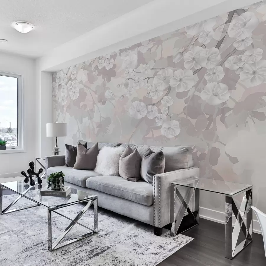 wall murals Cherry blossom branches with white flowers and grey leaves, on elegant floral silhouettes in soft pastel colors w08973v1