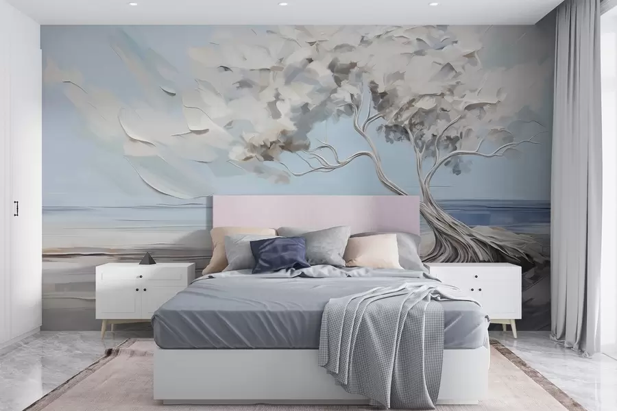 wall murals A white tree with thick and textured leaves on a sandy beach, landscape with a light blue sky w09205