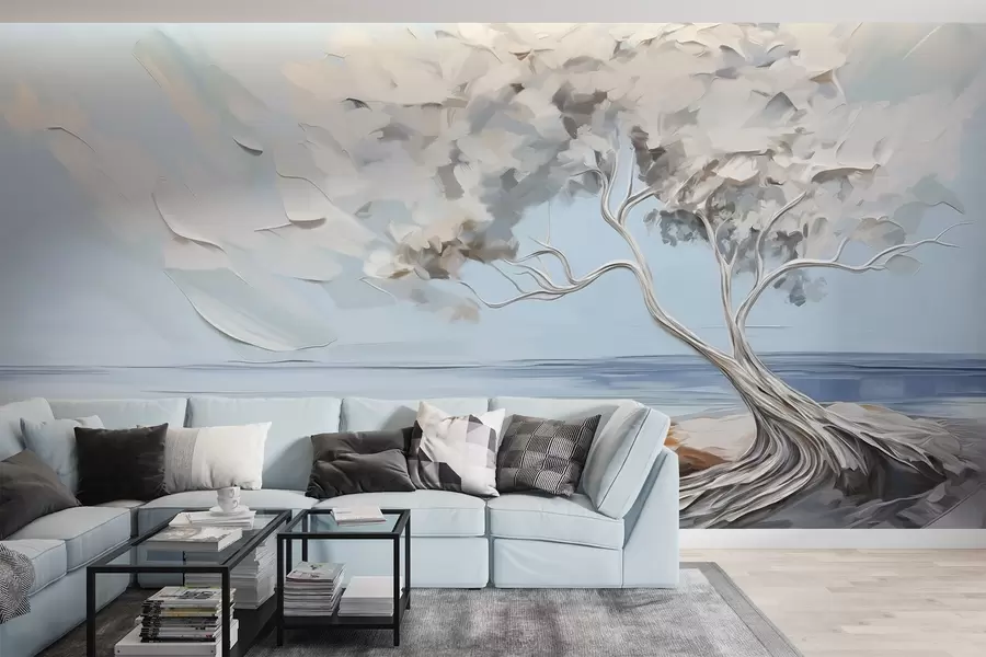 wall murals A white tree with thick and textured leaves on a sandy beach, landscape with a light blue sky w09205