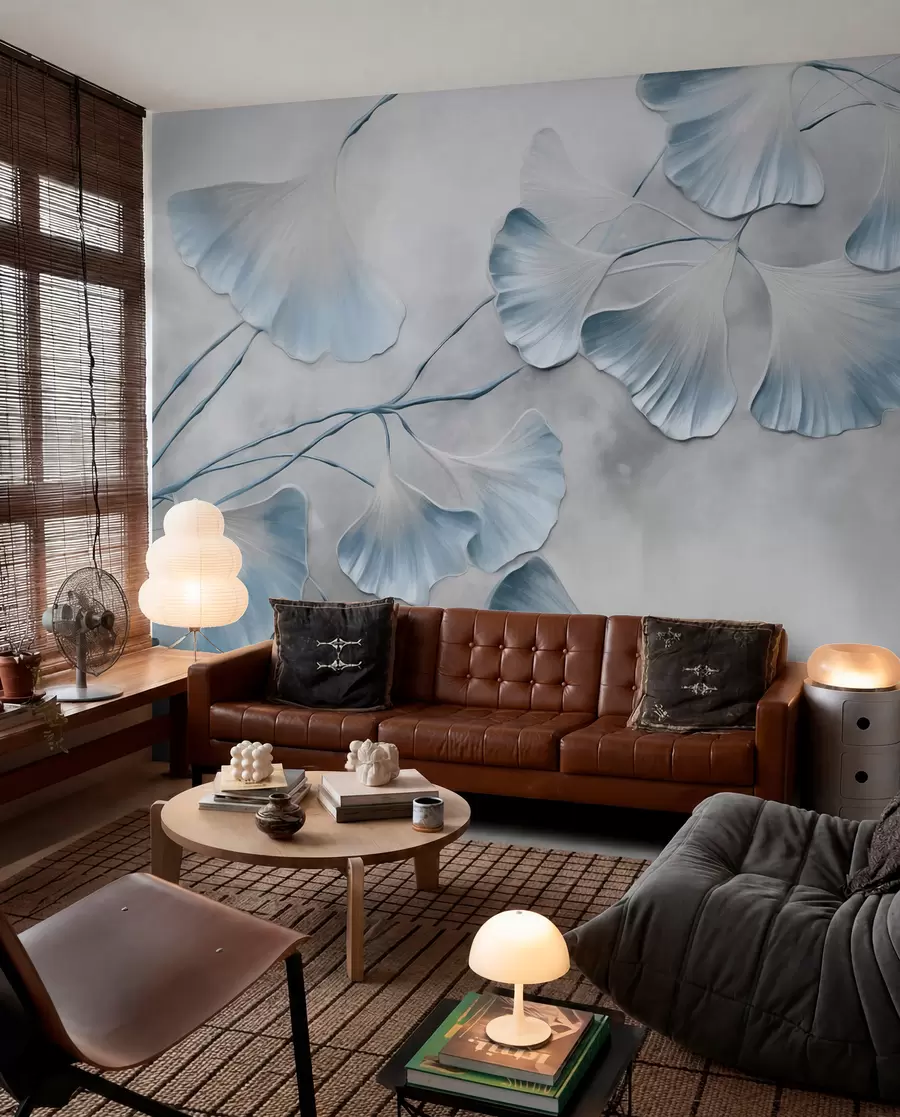 wall murals Ginkgo biloba leaves with blue edges on a branch, gray textured background, elegant and minimalist design w09472v1