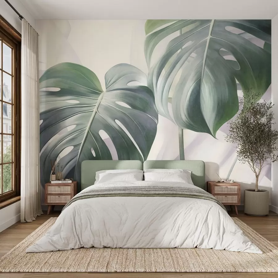 wall murals Textured monstera leaves large and green, against a soft, light abstract background w09477